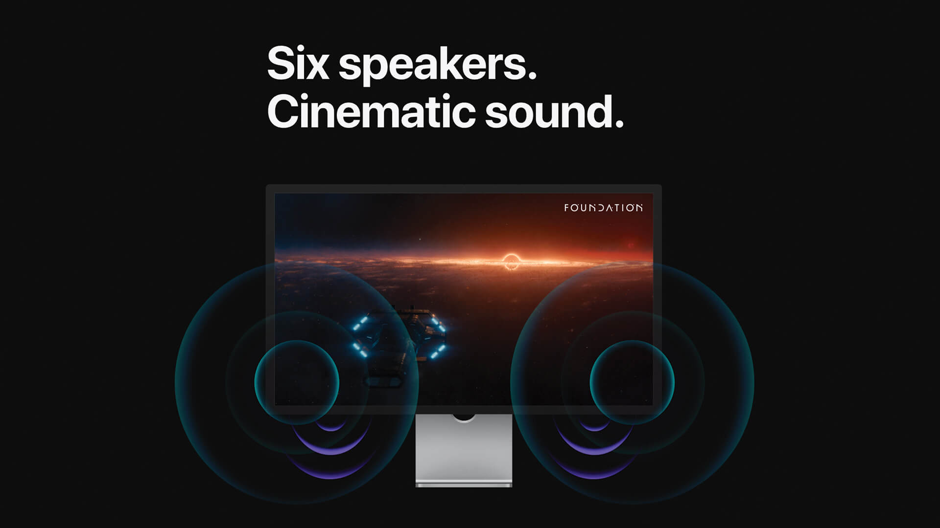 Six speakers. Cinematic sound. Monitor with waves emanating from the lower corners.